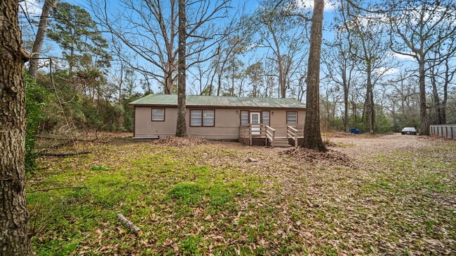 Photo - Rural, wooded living in this 4 bedroom, 2 full bath home on just under a quarter of an acre. NEW ...