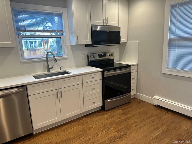 Photo - 219 Manorhaven Blvd Unit 1st Fl