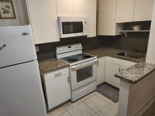 Photo - 1597 NE 53rd Ct