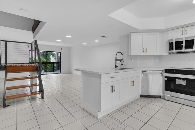 Building Photo - 8811 SW 130th Pl Unit 204