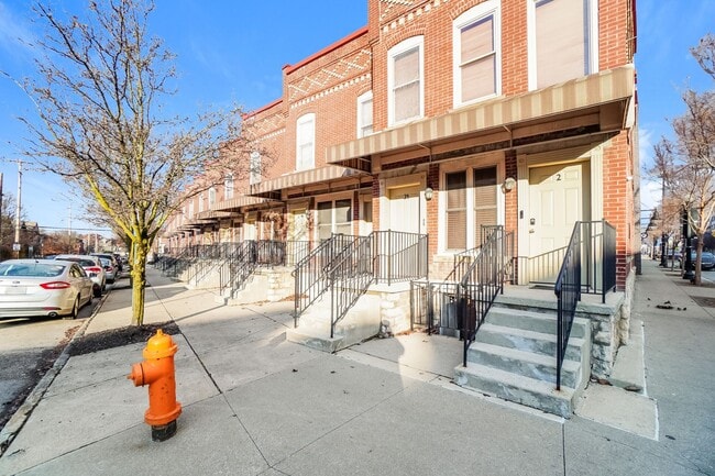 Building Photo - Charming 1-Bedroom Apartment with Exposed Brick, Hardwood Floors & Updated Kitchen