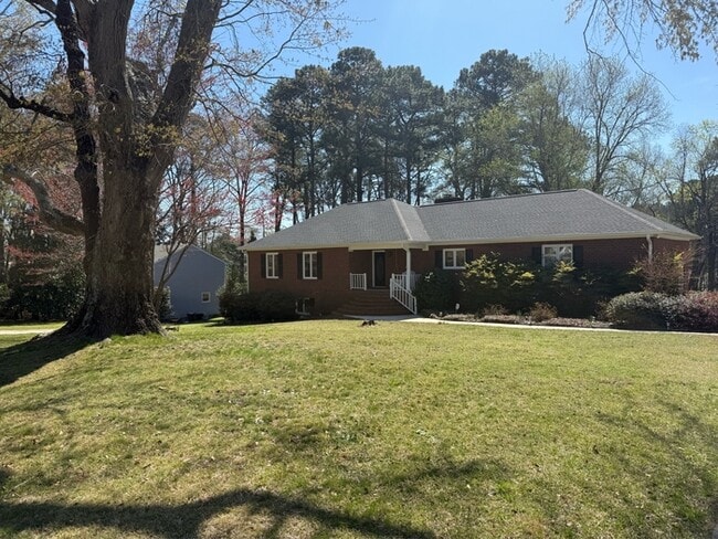 Building Photo - Spacious ranch, fenced yard, 2 car garage, large basement, near Wake Tech