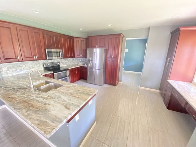 Building Photo - Wide Open Spaces – Renovated 5-Bedroom Hom... Rental