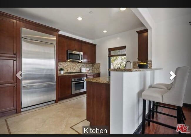 Photo - 10319 Almayo Ave Unit 101