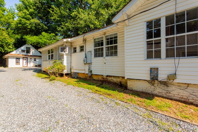 Newly spread gravel driveway - 1510 Glenwood Ave Unit A