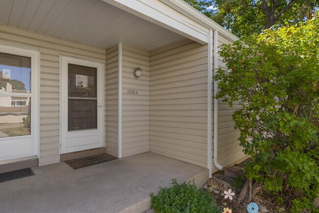 Updated Two-Bedroom with Carport Parking Next to Golf Course