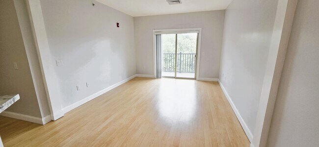 Living room from kitchen - Clock Tower Square