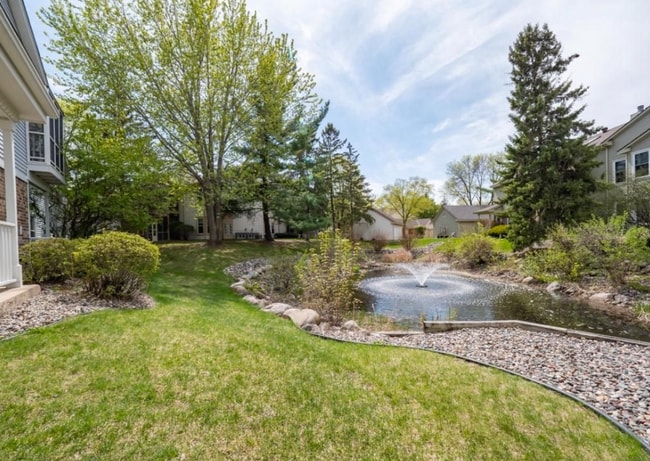 Fountain outside patio - 10918 Quebec Ave S