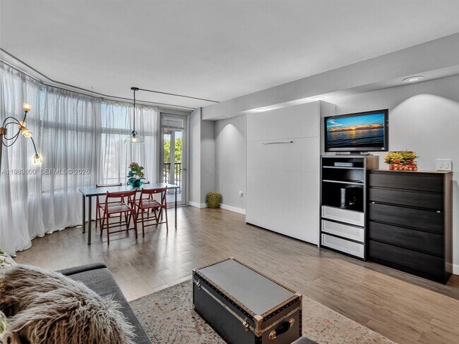 Building Photo - 3375 N Country Club Dr Unit 208