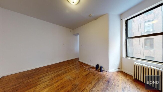 Building Photo - 411 E 70th St Unit 3A Rental