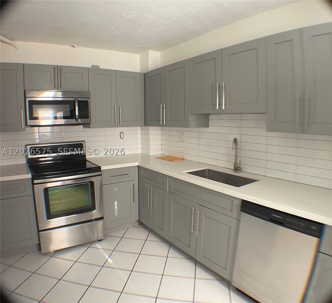 Building Photo - 12590 NE 16th Ave Unit 610