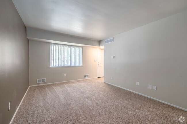 3BD, 1.5BA - 1,014SF - Living Room - Coppertree Townhomes
