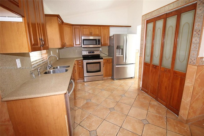 Photo - Northwest 57th Court, Hialeah, FL 33015 - ...