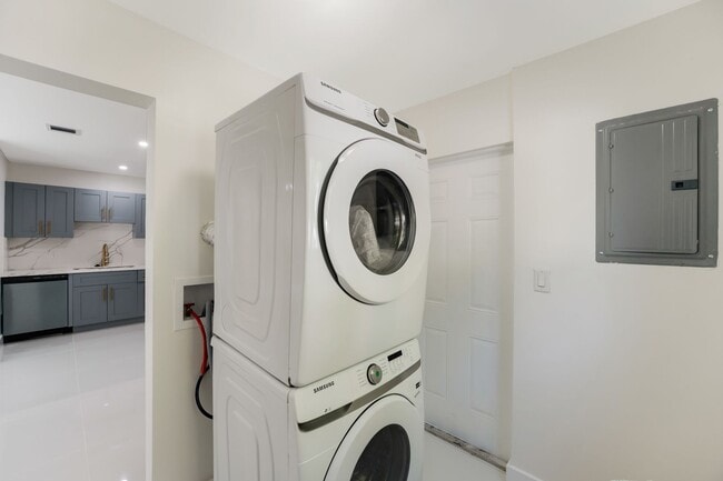 Photo - Fully renovated stylish 3 bed 2 bath home featuring a luxury kitchen, modern appliances on a fenc...