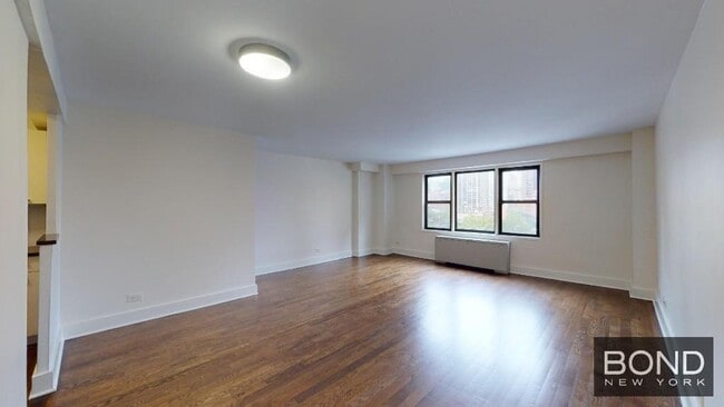 Building Photo - 220 E 63rd St Unit 10K Rental