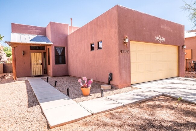 Photo - Gorgeous 3 Bedroom 2 Bathroom Home with Tile Throughout! Central A/C, 2 Car Garage!