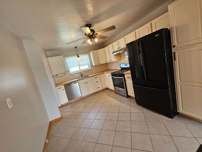 Photo - Newly Renovated 3-Bedroom, 1.5 Bathroom Brick Ranch w/ Hardwood Flooring in Living Room, Basement...
