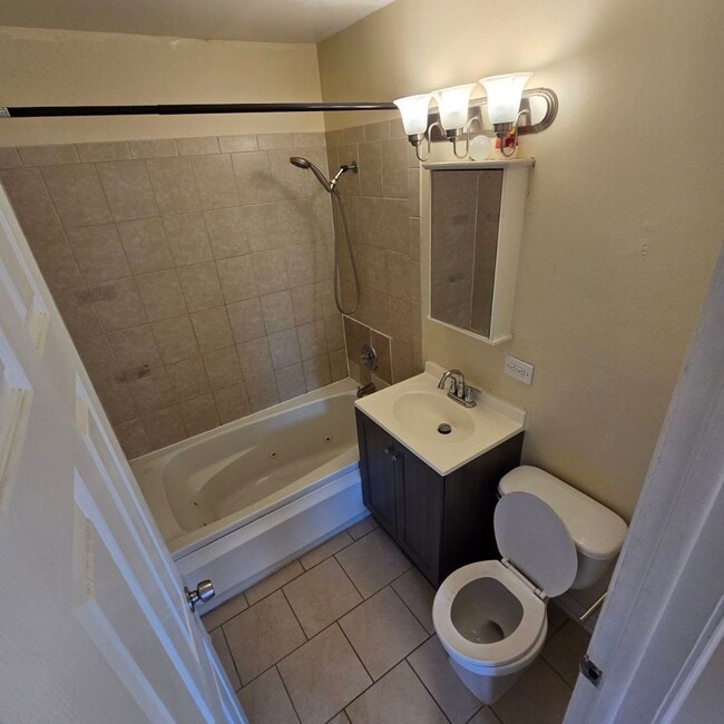 Building Photo - 4934 Harold Ave Unit 2D