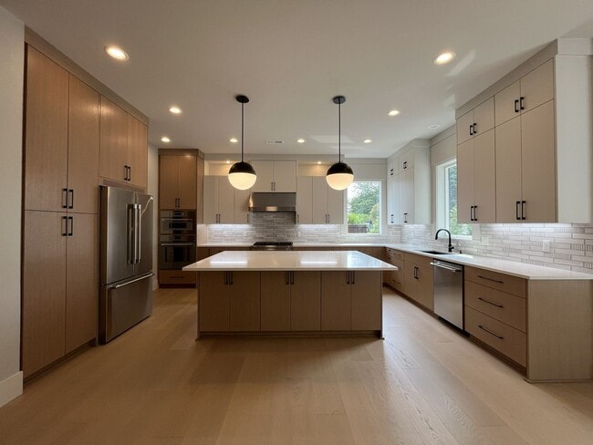 Photo - Brand-New 5-Bedroom Home with Main-Level Suite, Gourmet Kitchen, Luxury Finishes & Covered Patio