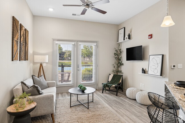 Oakwood - 2BR, 2BA - 1,110SF - Living ROom - Woodstone at Metro North Crossing