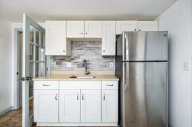 Building Photo - Renovated 4BR with In-Unit Laundry Near Moody Street