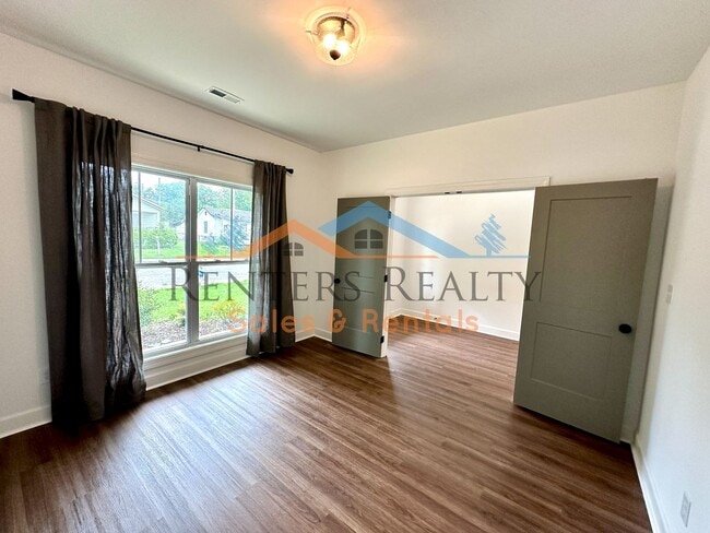 Photo - 3BR Home with Office, Bonus Room, Large Kitchen Island, 2-Car Garage & Large Yard – Huntsville Li...