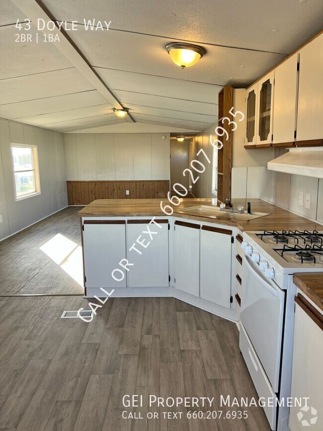 Building Photo - Cozy updated 2 bedroom home! Home Warranty...