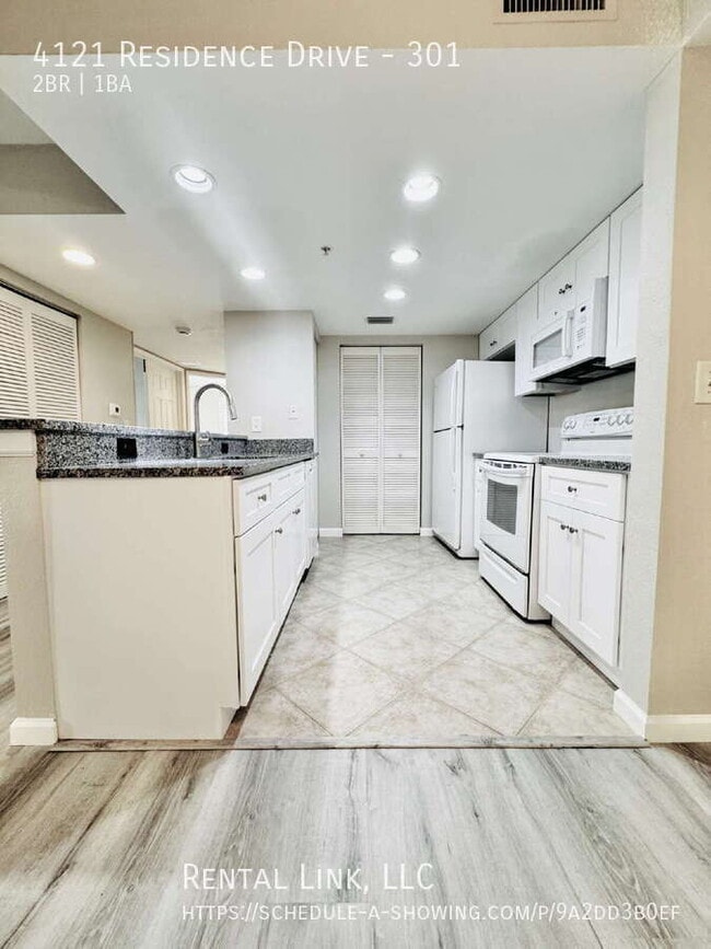 Building Photo - 4121 Residence Drive Unit 301