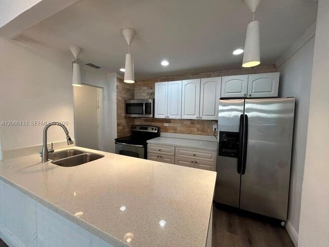Building Photo - 7545 E Treasure Dr Unit 1B