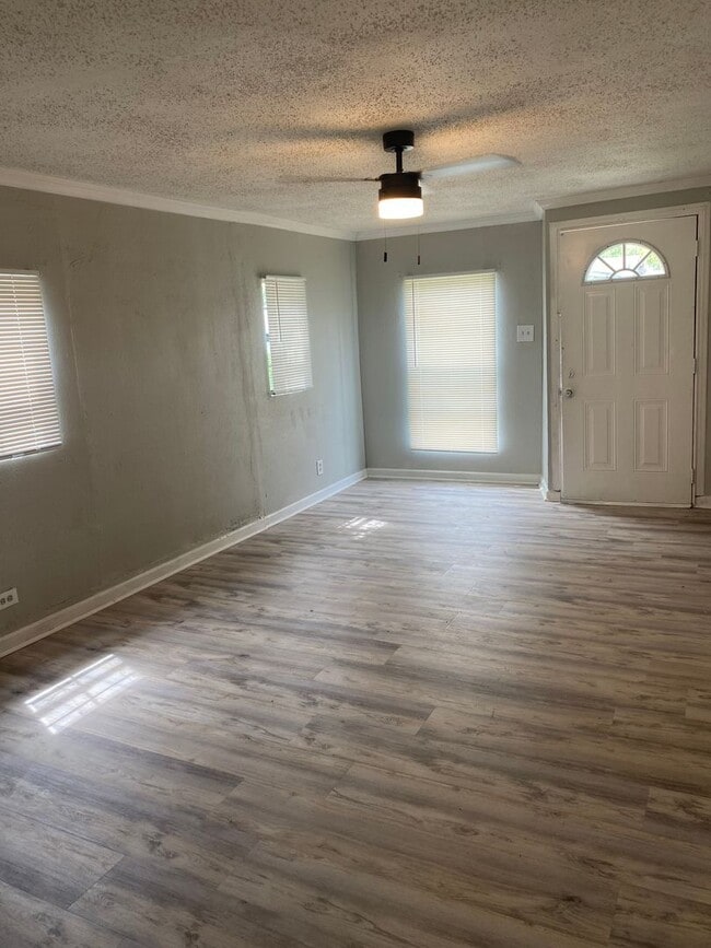 Photo - 2 Bedroom Home  with Fenced In Backyard 199.00 first month's rent