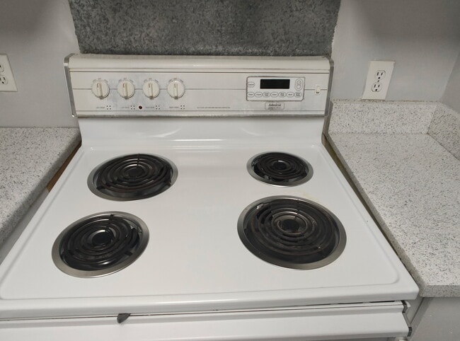 Building Photo - 9995 E Harvard Ave Unit 202