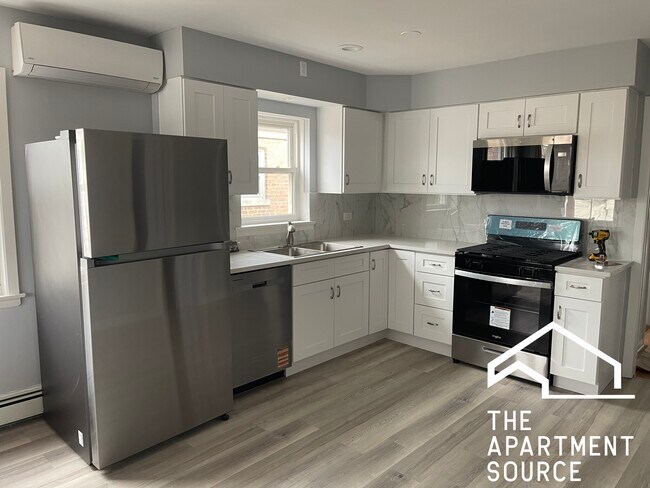 Building Photo - 2909 N Austin Ave Unit 2