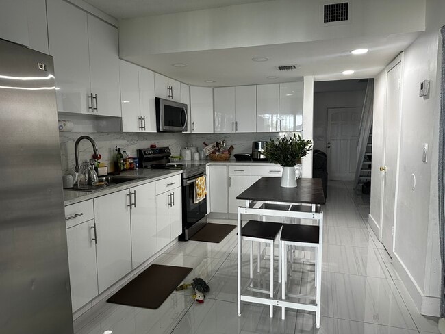 Photo - 5567 W 22nd Ct Townhome
