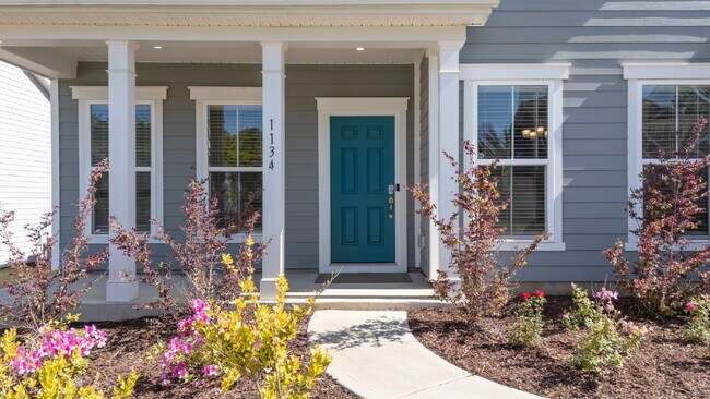 Photo - "Discover Spacious Living: 5-Bedroom Craftsman Home in Gated and Amenity-Rich Bretagne with Top-R...