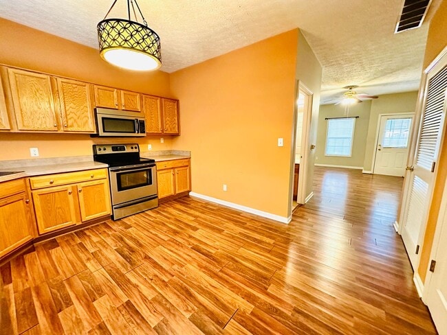 Photo - Updated 2 story townhome in Park Duvalle- ...