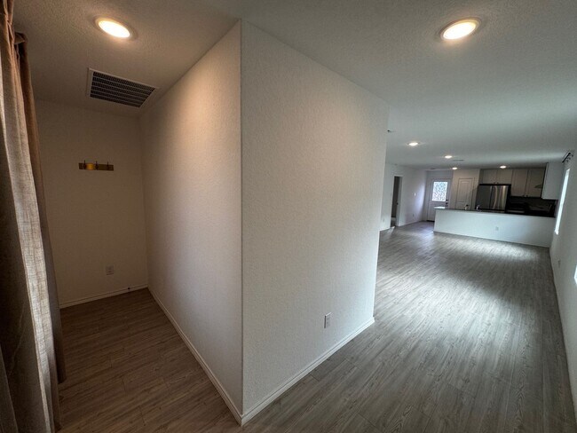 Photo - Modern 2024 New-Build with Open-Concept Living and Private Primary Suite in Waterwheel Subdivision