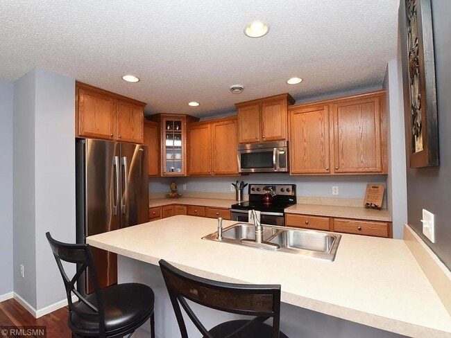 Photo - 3 Bedrooms | Loft | Upper-Level Laundry | 3-Sided Fireplace | Woodbury