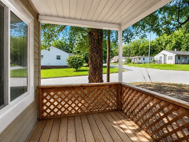 Photo - Bright 3-Bedroom Home with Covered Porch, Fireplace & Wooded Backyard