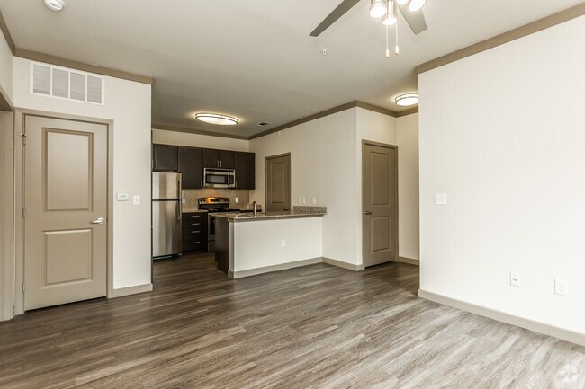 1BR, 1BA - 628SF Living Room & Kitchen - Tacara at Westover Hills