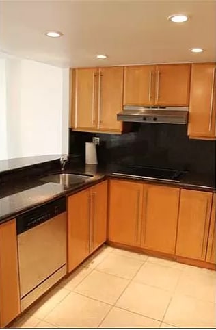 Kitchen with pass-through to the living room - 600 NE 36th St Unit 1020