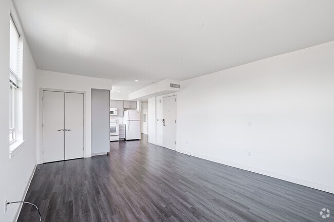 2BR, 1BA - 1,082SF - Living Room & Kitchen