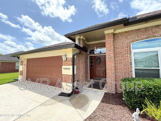 Building Photo - 12950 Deep River Way Rental