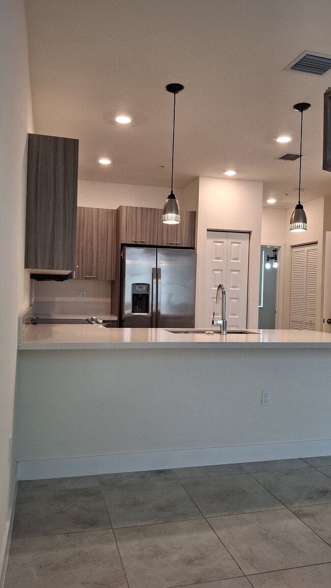 Building Photo - 10290 NW 64th Ter Unit ANDMARK AT DORAL Rental