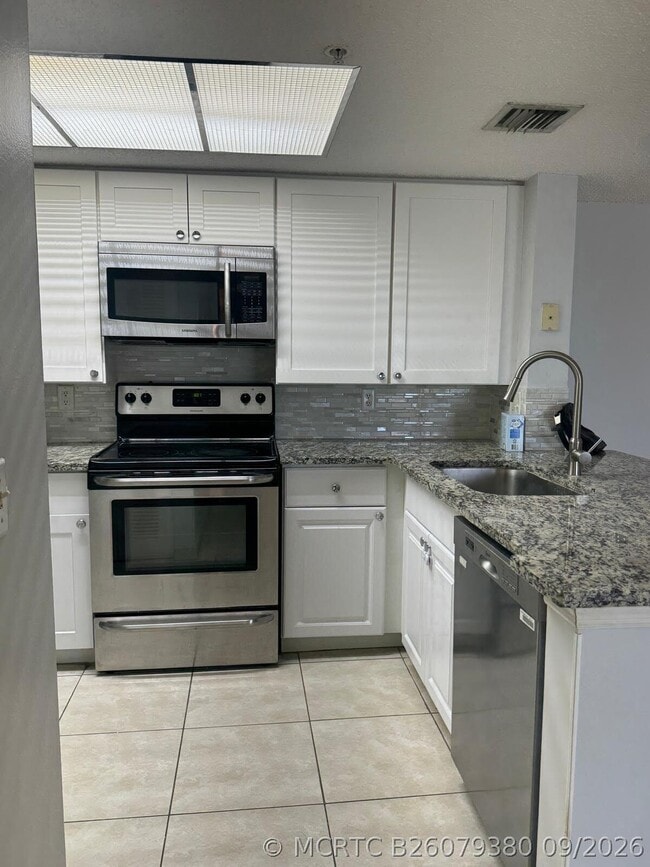 5045 Wiles Rd Unit 308