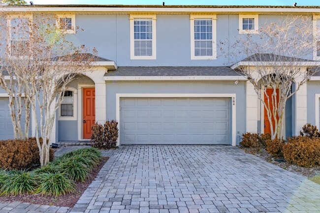 Building Photo - Modern 3-Bed Townhome with Garage & Patio in Casselberry – In-Unit Laundry, Central AC!