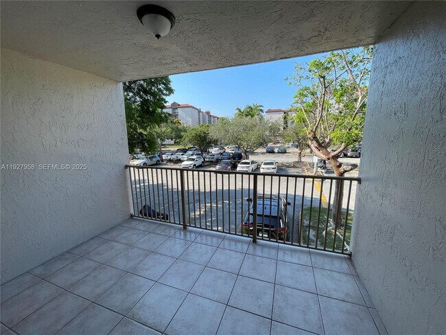 Building Photo - 15201 SW 80th St Unit 206