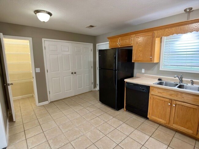 Photo - 3 Bed, 2 Bath Home with Fenced Backyard and 2-Car Garage in Brookland