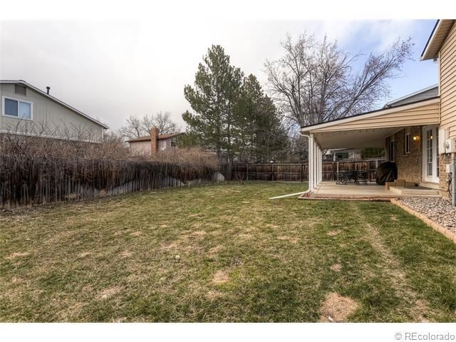 plenty of room for play time with your dog or dogs; automatic sprinkler system in front and back - 7091 Beech Street