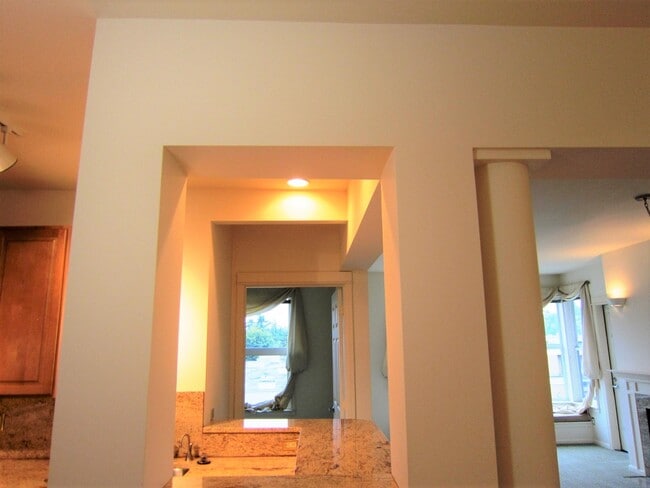Master bathroom with soak tub, double vanity - 10042 Main St Unit 405-Lakeview