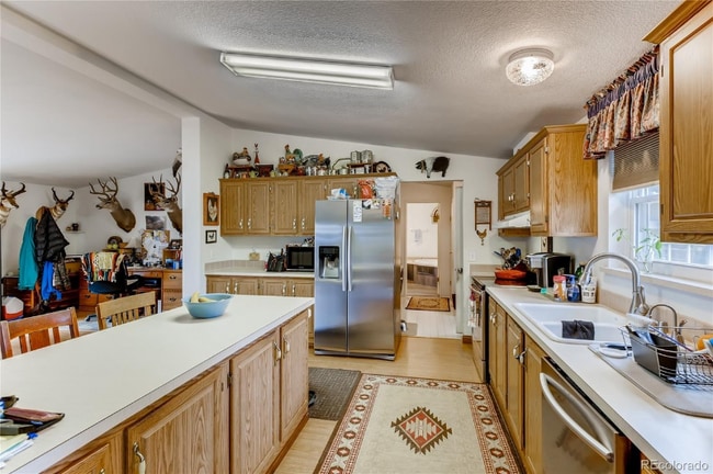 Photo - 9040 W 64th Pl